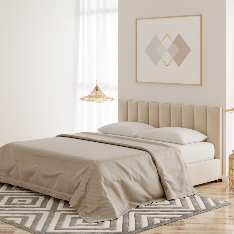 Interior of a beige bedroom with a horizontal poster on the wall